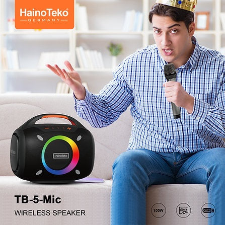 Portable 100W speaker TB-5 in outdoor setting with colorful LED lights.